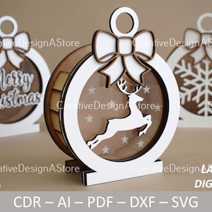 Weihnachtskugel Geschenkbox Laser Cut Datei Vorlage SVG Datei DXF mit Schneeflocke Rentier oder Frohe Weihnachten Detail CDR Datei 1 Größe 3 Designs
