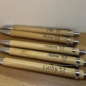 Unique personalized ballpoint pens made of bamboo with personalized engraving - your story, your writing!