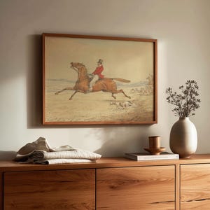 Classic artwork poster for dining room — serene depiction of a mounted hunter amidst rolling fields and distant riders.