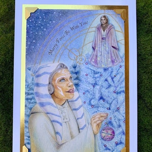 May include: A watercolor illustration of a Star Wars character standing in front of a blue Christmas tree. The character is wearing a blue and white robe and has a blue headband. The tree is decorated with ornaments, including one that says "Sky Guy Snips". The text "Merry Force Be With You!" is written in the top right corner of the image.