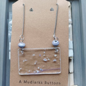 Handmade lilac stained glass and lampwork bead pendant necklace combined with stainless steel chain.