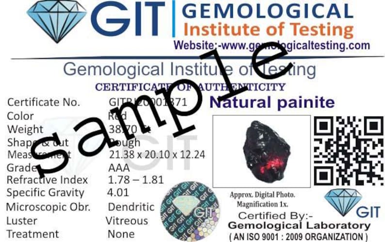 May include: A Gemological Institute of Testing (GIT) certificate for a natural painite gemstone. The document details the gem's colour, weight (38.70), shape, measurements (21.38 x 20.10 x 12.24 mm), and grade (AAA). Includes a photo of the stone.