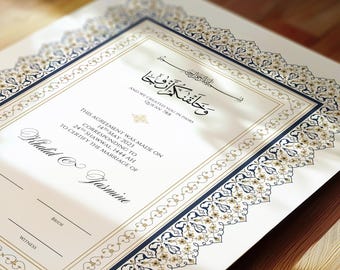 May include: A white Islamic marriage certificate with a gold and blue decorative border. The text reads "This agreement was made on 14 May 2023, corresponding to 24th Shawwal, 1444 AH, to certify the marriage of Khalid & Jasmine".