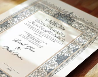 May include: A white wedding certificate with an ornate border in shades of blue and gold. The text reads "This Agreement was made on 24th Jumada Al-Awaal, 1444H corresponding to 8th December 2021 to certify the marriage of Wazrul Islam & Waila Parvin".