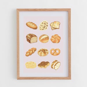 May include: A framed print featuring a variety of bread illustrations. The artwork showcases different types of bread, including loaves, rolls, and a pretzel, all in shades of brown and tan against a light pink background. The frame is made of wood.