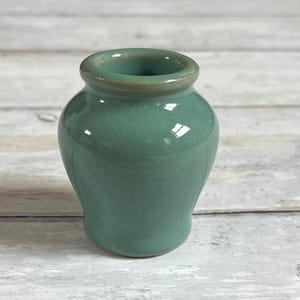 Small stoneware Fortnum and Mason green mustard pot bud vase