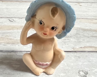 Vintage kitsch ceramic baby figurine