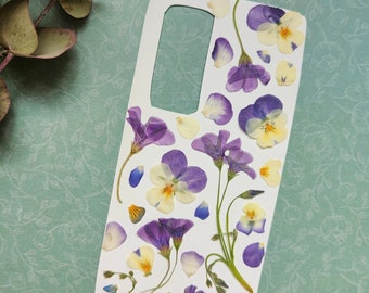 Coque de téléphone avec fleurs pressées