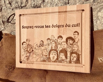 Planche apéro / à découper gravé kaa à s’offrir avec  tout les personnages