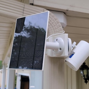 Double-Side Downspout Mount for Solar Panels and Security Camera