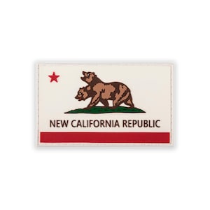 May include: Rectangular patch featuring the New California Republic flag. The design includes a brown bear, a red star, and the text "NEW CALIFORNIA REPUBLIC" on a white background, with a red stripe at the bottom.