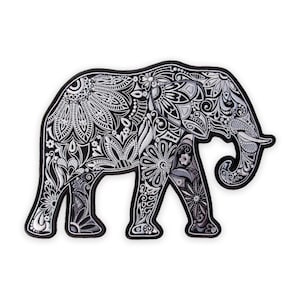 May include: Black and white elephant patch with intricate floral and geometric patterns. The elephant design features a detailed outline and is filled with various flower and leaf motifs. The patch has a black border.