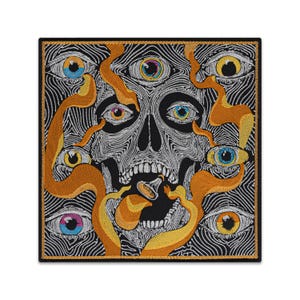 May include: Embroidered patch featuring a skull with multiple eyes and orange tendrils against a black background with a wavy pattern. The patch has a black border and is square-shaped. The skull has a detailed, intricate design.