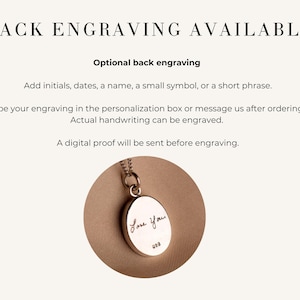 May include: A silver pendant necklace with a chain. The pendant is oval-shaped with the words "Love You" engraved on the front. The text "BACK ENGRAVING AVAILABLE" is at the top of the image, with additional text below describing the engraving options.
