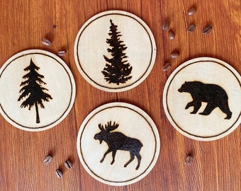 Set of handmade, wood burned North American Wildlife silhouette coasters