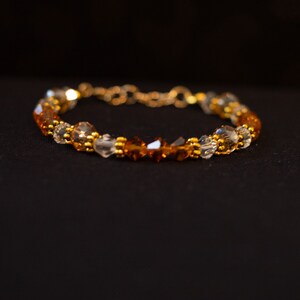 Orange and clear crystal bracelet with gold