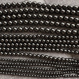 Schwarze Turmalin Edelstein Perlen am Strang 4/6/8/10/12mm - Naturstein Halbedelstein Perlen zur Herstellung von Schmuck, Ketten, Armband