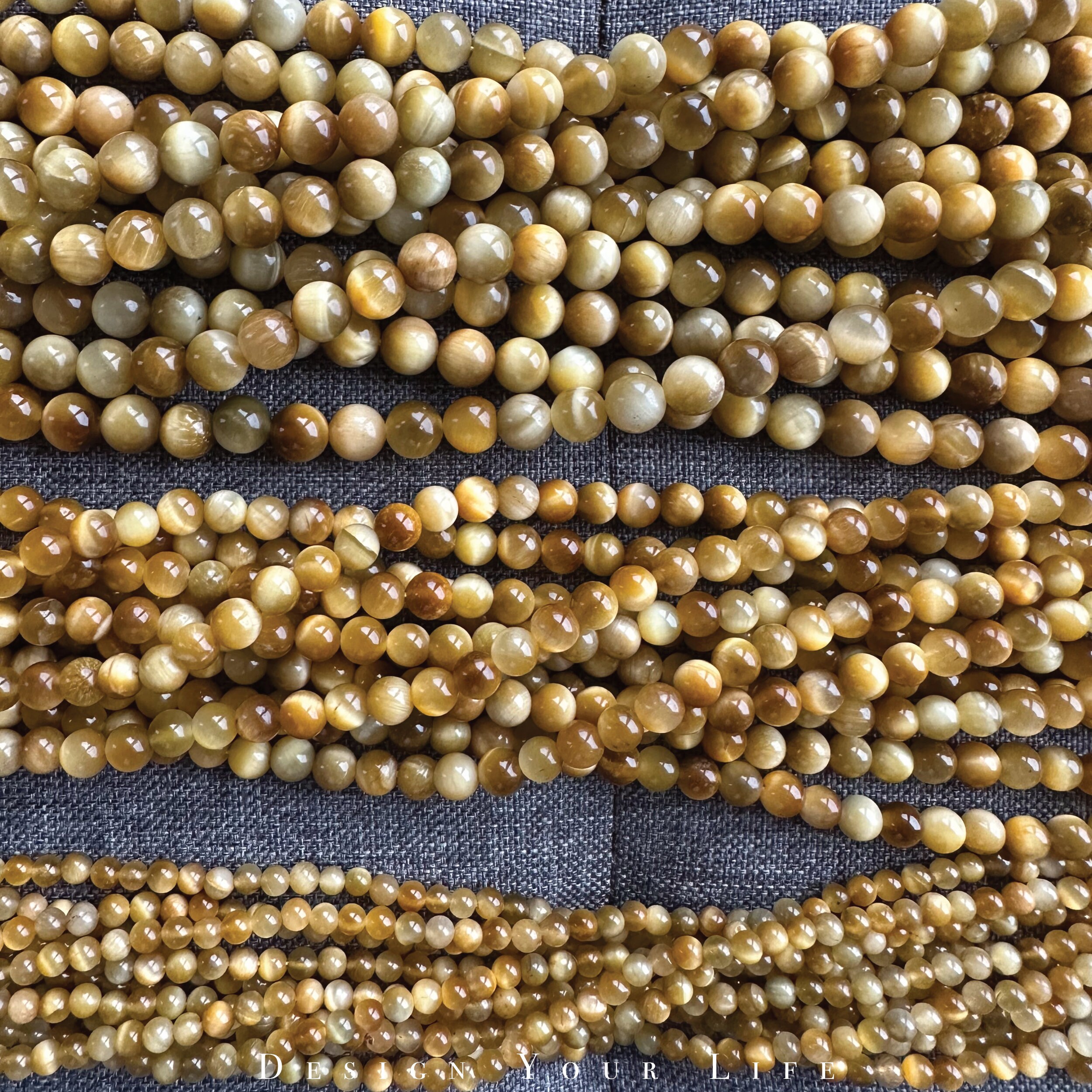 Golden Tiger Authentic Tiger Eye Stone Beads in a Tri Strand with Gold tone closure main image 0