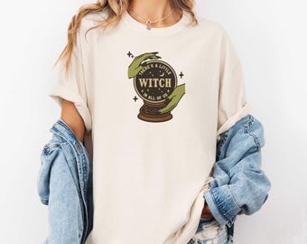 There's a Little Witch in All of Us Shirt, Magical Tee, Crystal Ball Graphic Tee, Funny Witchy Slogan Shirt, Halloween Witch Lover Gift