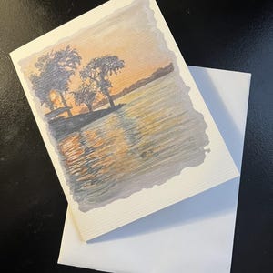Zonsondergang op het water