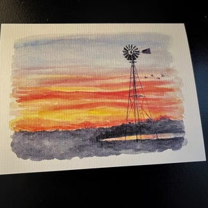 Moulin à vent au coucher du soleil