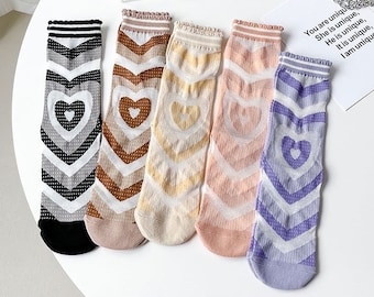 Valentine's Day socks with heart patterns, partly semi-transparent and with beautiful cuffs