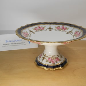Ahrenfeldt Limoges Comport / Tazza c.1900-1910. Floral pink rose pattern with heavily gilded cobalt blue border. Superb condition
