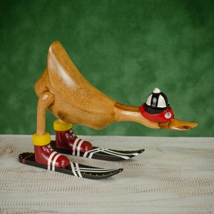 Hand Carved, Hand Painted Wooden Sculpture of a Duck on Skis