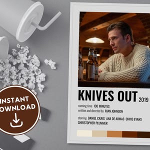 May include: A minimalist movie poster for the film "Knives Out" (2019) featuring a man in a white sweater. The poster includes the title, running time, director, and cast. The poster is in a gray frame with a color palette of beige, brown, and dark brown.