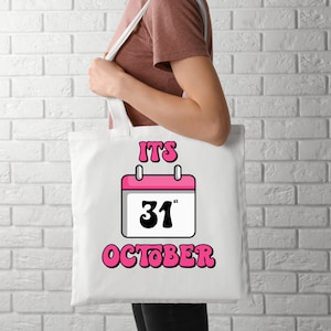 May include: White tote bag with a pink calendar design and the text "IT'S 31" OCTOBER".