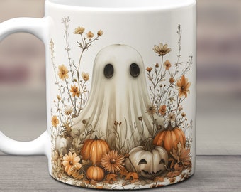 May include: White ceramic mug with a ghost illustration surrounded by orange and yellow flowers and pumpkins. The ghost has black eyes and a white sheet-like body.