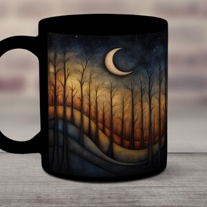 May include: Black ceramic mug with a colorful illustration of a crescent moon and trees in a forest setting. The trees are silhouetted against a dark blue sky with stars.