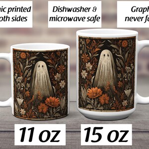 May include: Two white ceramic mugs featuring a ghost design set against a backdrop of brown, orange, and cream flowers and foliage. The mugs are labelled 11 oz and 15 oz. Text on the image says "Graphic printed on both sides", "Dishwasher & microwave safe", and "Graphic never fades".