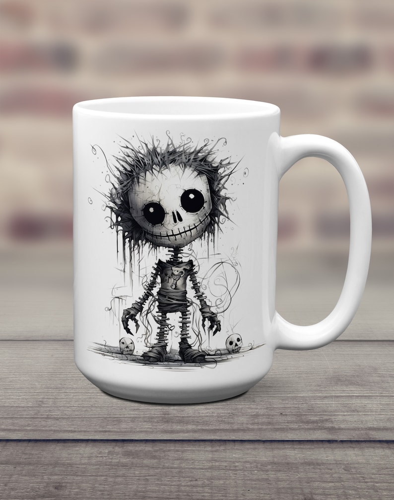 May include: White ceramic coffee mug with a black and white illustration of a cartoon skeleton with a mischievous grin. The skeleton is wearing tattered clothing and has a skull in each hand.