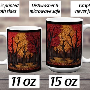 K&ouml;nnte beinhalten: Zwei wei&szlig;e Keramikbecher mit einem bunten Herbstwaldmotiv bedruckt. Die Becher sind 11 oz und 15 oz gro&szlig;. Der Text "Graphic printed on both sides", "Dishwasher & microwave safe" und "Graphic never fades" ist auf dem Hintergrund gedruckt.