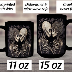 May include: Two black ceramic mugs with a graphic of two skeletons embracing. The text "Graphic printed on both sides" is above the smaller mug. The text "Dishwasher & microwave safe" is above the larger mug. The text "Graphic never fades" is above the larger mug. The smaller mug is 11 oz and the larger mug is 15 oz.