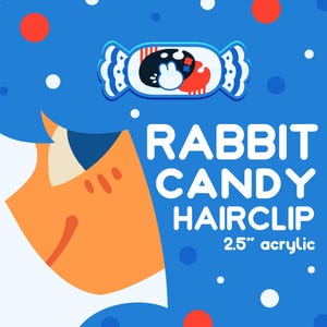May include: A blue background features a cartoon image of a candy wrapper with a rabbit design. The text reads "RABBIT CANDY HAIRCLIP 2.5" acrylic". The hairclip is a fun accessory.