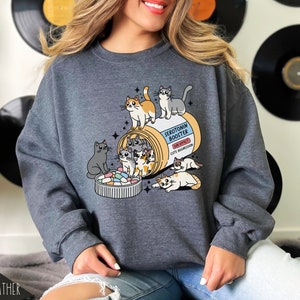 Mental Health Matters - Show your love for cats and support for mental health with our Antidepressant Cat Sweatshirt