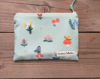 Waterproof lined zipper bag great for make up, essential oils, and toiletries- mushroom, garden print