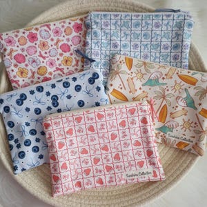 Waterproof lined zipper bag great for make up, essential oils, and toiletries- choose your print
