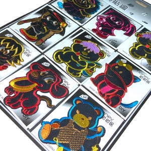 Set stripfiguren opstrijkpatronen | 9 stuks | 9 x 6 cm | Borduurapplicatie | DIY-kledingdecoratie | Stoffen patch | Naaibenodigdheden