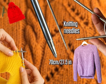 May include: Image featuring knitting needles, a red knit hat, and a purple cable-knit sweater. The text "Knitting needles" is visible. The image also shows a yellow knitted piece and the measurement "70cm/27.5 in".