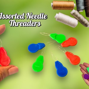 May include: Image of assorted needle threaders in red, green, and blue. The threaders are shown with spools of thread in various colors. The text "Assorted Needle Threaders" is displayed in a stylized font.