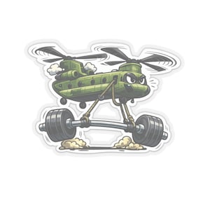 Op de afbeelding: Een cartoonsticker met een groene militaire helikopter die een halter met gewichten optilt. De helikopter heeft een boos gezicht en is omgeven door wolken. De halter heeft twee grote, grijze gewichten.