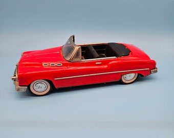 1950's Pressed Steel Buick Toy Car....Made in Japan...Niftie Fifties Buick Red