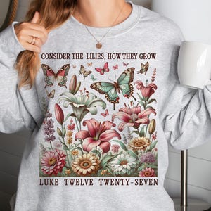 Floral Christian Bible Verse Sweatshirt Luke 12:27 Scripture Sweater Long Sleeve Shirt Flowers Religious Gift Consider The Lilies