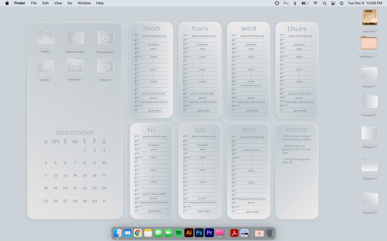 Op de afbeelding: Een computerscherm met een digitale kalender voor december met een dagelijks schema voor elke dag van de week. De kalender is in een lichtgrijs kleurenschema met een witte achtergrond. Het notitiegedeelte bevat een lijst met herinneringen voor kerstmis.