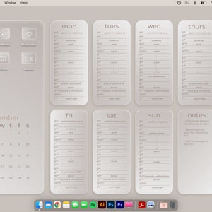 Op de afbeelding: Een computerscherm met een kalender voor december met een dagelijkse planner voor elke dag van de week. De planner bevat notities voor kerstinkopen en het uitwisselen van cadeaus.