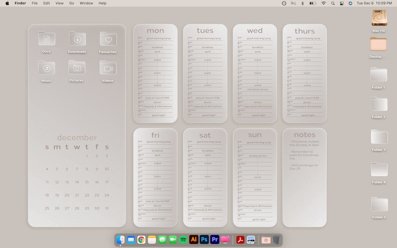 Op de afbeelding: Een computerscherm met een kalender voor december met een dagelijkse planner voor elke dag van de week. De planner bevat notities voor kerstinkopen en het uitwisselen van cadeaus.