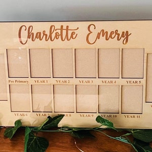 School years photo frame. Frames come personalised with your child’s name. Wooden or white frames available.